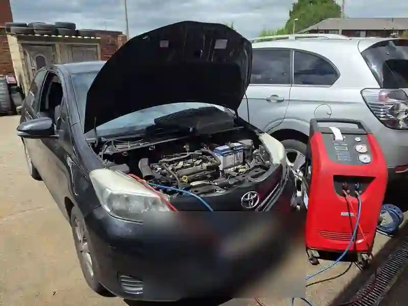 A Toyota on the forecourt at M&A MOT & Repair Centre on Bishop Street